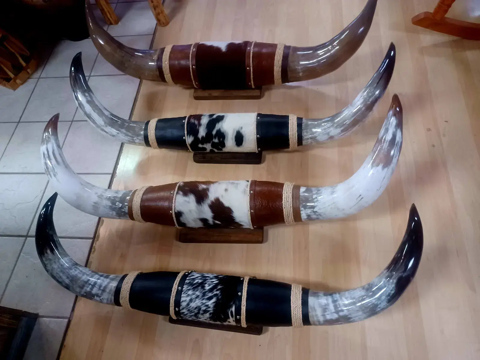 A row of carved cow horns